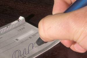 Charged for writing a bad check in California.