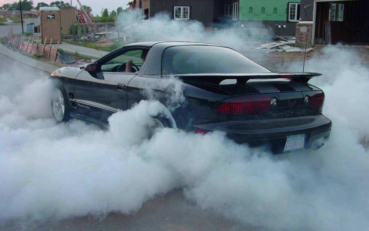 Burning out or revving your engine are illegal acts of exhibition of speed in California. exhibition of speed - burnout